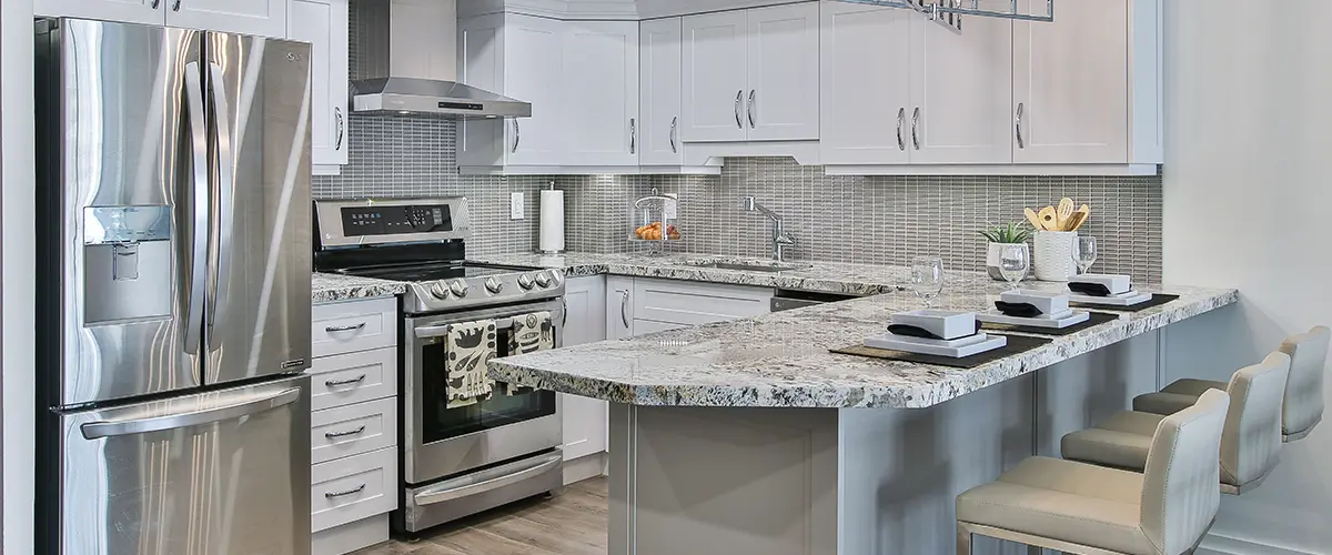 Granite countertop in a U kitchen layout