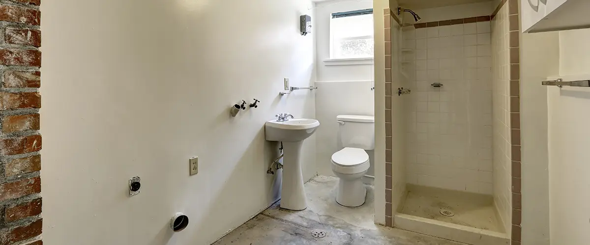 Ugly and dated basement bathroom