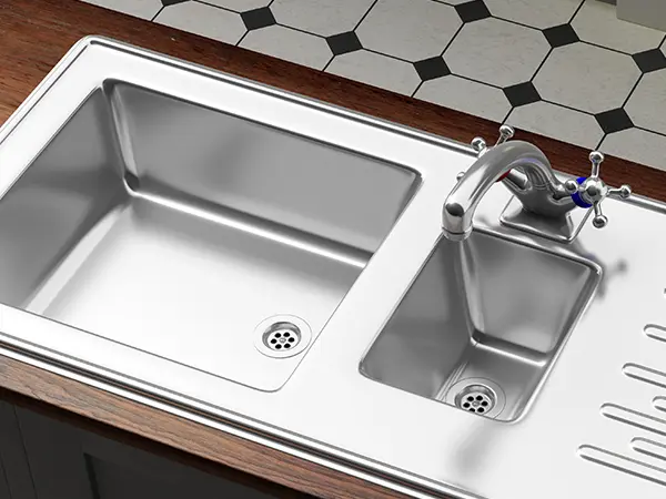 A stainless steel drop-in sink