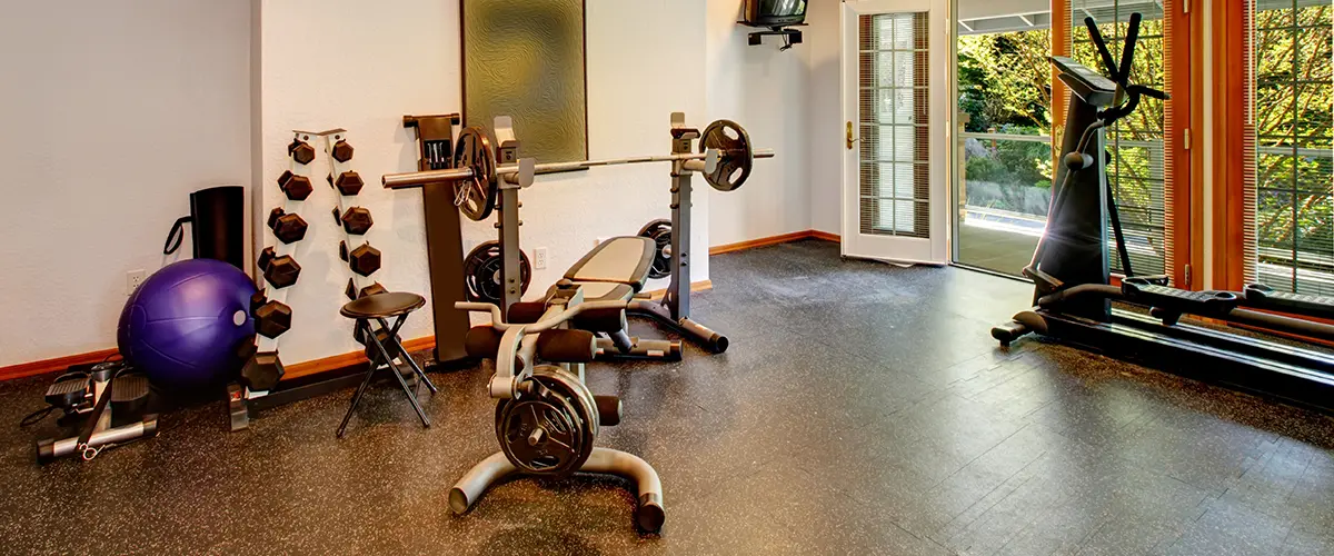 An in-house gym in a walkout basement