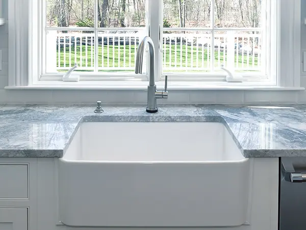 An undermount sink with granite countertop