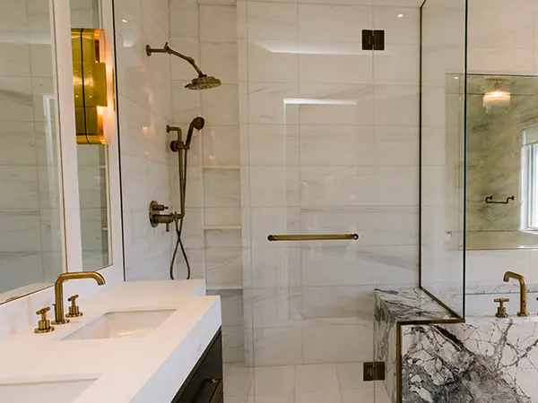 glass walk-in shower with black features