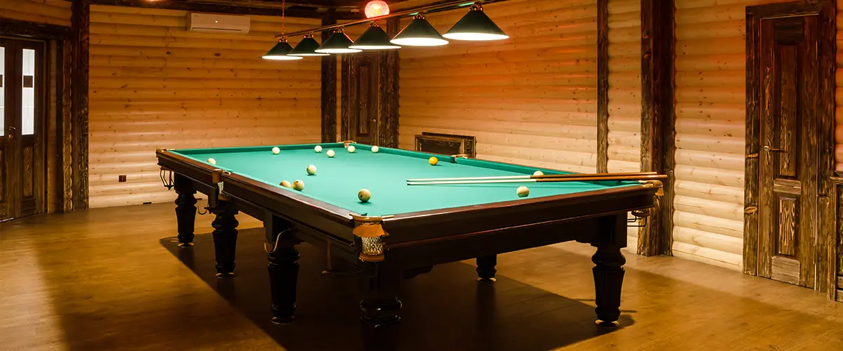 A pool table in a basement transformed a man cave
