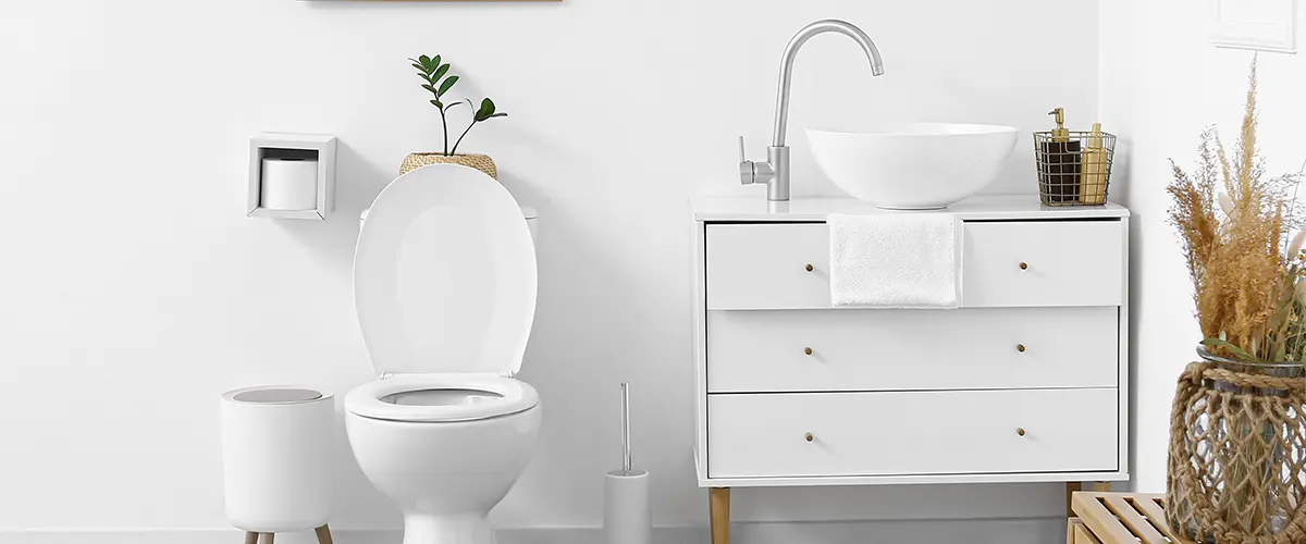 A toilet and a sink in a bathroom