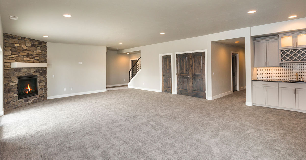 Basement with carpet flooring